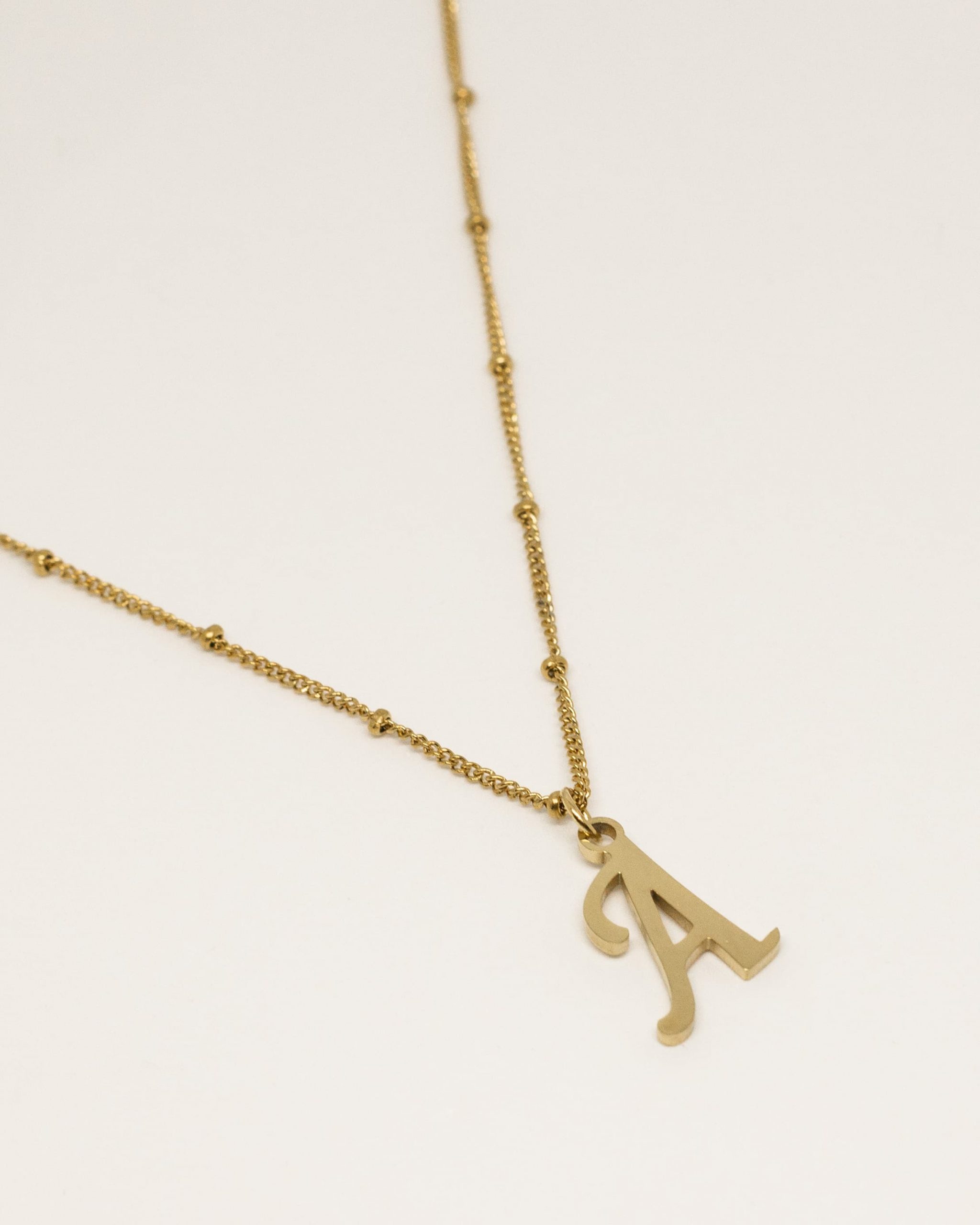 Collier initiale acier inoxydable